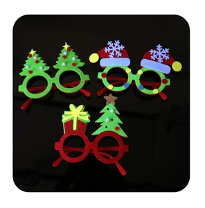 Three assorted Christmas party glasses featuring Christmas trees and hats on black base