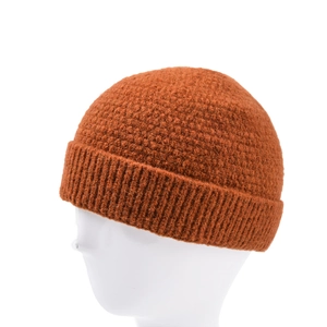 Orange knitted brimless beanie for men and women on a white mannequin head display