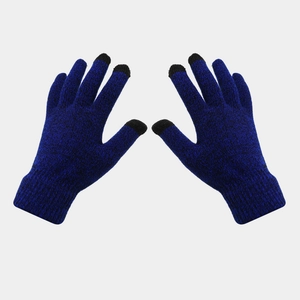 Detail of dark blue knitted gloves with black touchscreen fingertips and ribbed cuffs