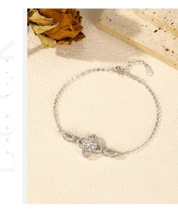 Detailed shot of S925 silver flower bracelet with sparkling stones and lobster clasp