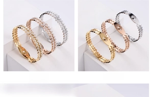 Detail of high elasticity wave-shaped bangles with rhinestones in gold, rose gold and silver
