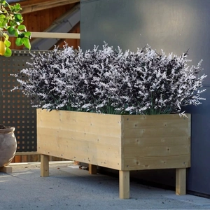 Artificial black and white lavender in a wooden planter box for modern outdoor decor
