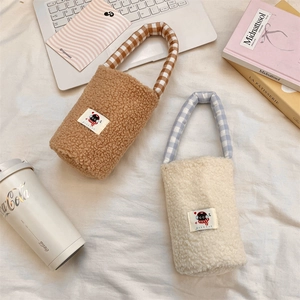 Furry lamb wool water bottle bags in brown and beige with checkered fabric handles