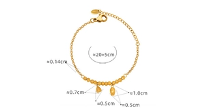 Detail view of vintage gold lotus bracelet with size specifications and beaded chain design