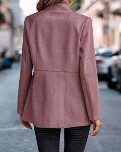 Back view of a slim fit mauve blazer with a detailed herringbone knit texture pattern