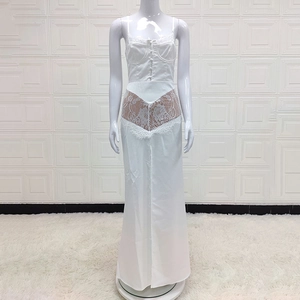 Elegant white satin maxi dress with lace inserts and thin straps for a formal summer look
