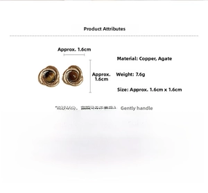 Detailed specs of retro spiral copper earrings with tiger eye agate stones and silver pins