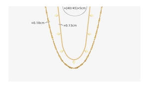Detail of double-layer gold chain showing 40/45+5cm dimensions and rhombus charms