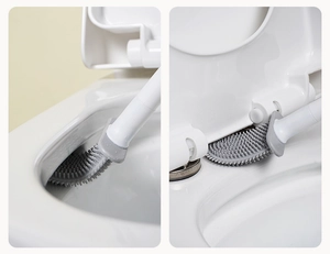 Close-up of flexible silicone toilet brush cleaning rim and narrow gaps effectively