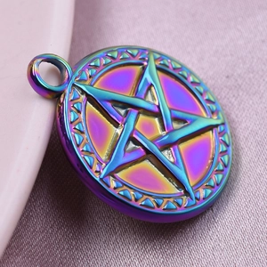Macro shot of an iridescent pentagram star pendant with rainbow metallic finish