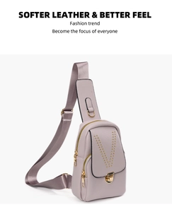 Detail view of the light purple crossbody bag featuring stylish gold rivet V-decorations