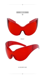 Front and 45-degree side macro view of red one-piece oversized sports sunglasses frames
