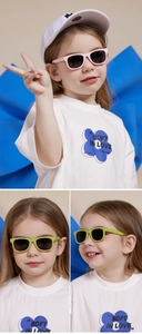 Detail of pink and lime green toddler silicone sunglasses with UV protection lenses