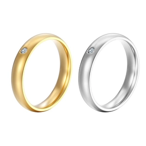 Minimalist 3mm stainless steel rings in gold and silver finish with small gemstones