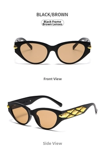 Detail view of black cat-eye sunglasses with brown lenses and golden diamond side decor