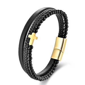 Multi-layer men's leather bracelet with a gold cross charm and magnetic clasp