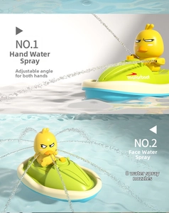 Detail of baby bath duck boat with adjustable spray arms and eight water outlet holes
