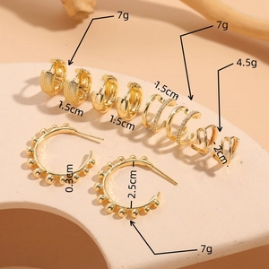 Set of 6 pairs golden hoop earrings with zircon heart charms and beaded textures