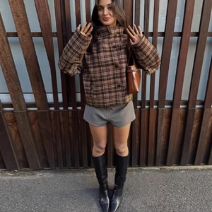 Women's plaid cropped jacket with stand collar and button front in brown checkered pattern