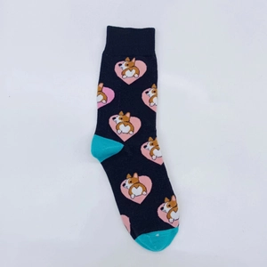 Detail of knitted Corgi crew socks with pink hearts and contrast blue toe and heel
