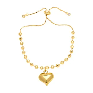 Minimalist 18k gold plated bead bracelet featuring a heart pendant and adjustable slider
