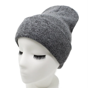 Detail of dark grey ribbed knit beanie showing soft wool blend texture and wide cuff