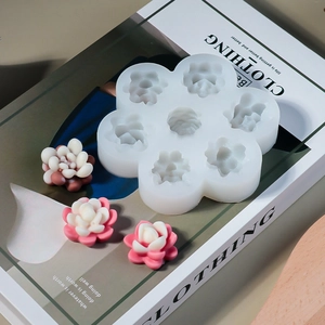 Detailed macro view of a 7-cavity silicone mold for DIY succulent and flower resin crafts