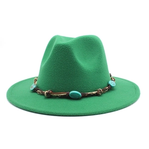 Detail of emerald green wool jazz fedora with turquoise beads and metallic chain trim