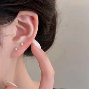 Minimalist freshwater pearl stud earrings for women with elegant white luster design