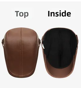 Détails de la casquette en cuir PU grainé marron montrant les coutures et la doublure