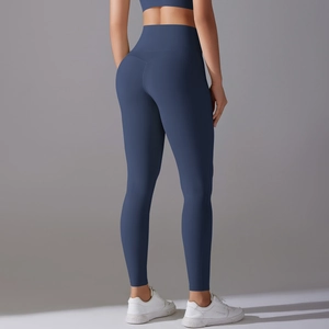 Detailed view of high-waisted yoga pants with V-shaped stitching for a butt-lifting effect