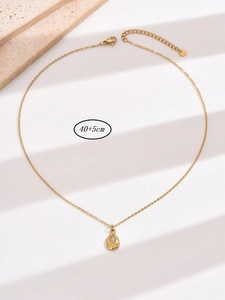 Detailed view of golden teardrop zircon necklace with 40+5cm length measurement