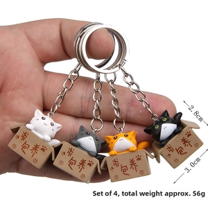 Detail view of 3D cartoon cats in miniature boxes with 2.8cm by 3.0cm size dimensions