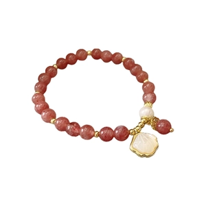 Pink strawberry crystal beaded bracelet with pearl, gold shell charm and floral accents