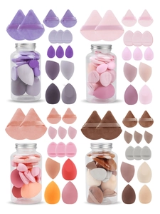 Multi-shape makeup sponge set with teardrop and triangle puffs in a storage jar