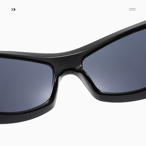 Macro detail of futuristic sunglasses nose bridge and black frame with dark grey lenses