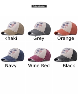 Collection of six vintage washed cotton baseball caps in various colors with retro prints