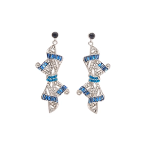 Vintage silver bow earrings with blue crystals and sparkling rhinestones on white background