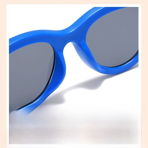 Detail of integrated nose pads on blue sunglasses for children's comfort and fit