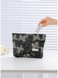 Elegant butterfly embroidery cosmetic bag with silver patterns and woven H&R BAG logo