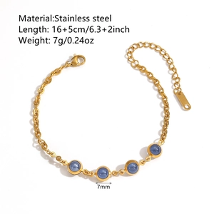Elegant 18k gold plated stainless steel bracelet with four round blue translucent gemstones