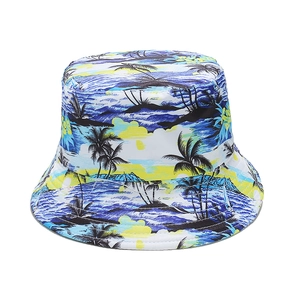 Detail of tropical palm tree and ocean sunset print on a summer sun bucket hat
