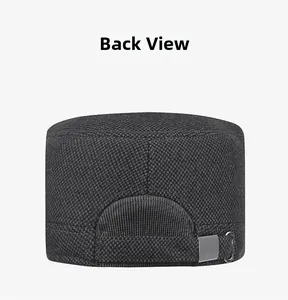 Detail view of the black winter cap back featuring an adjustable metal buckle strap