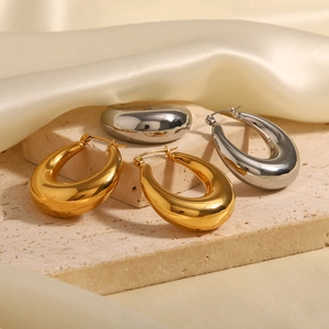 Modern hollow teardrop hoop earrings in gold and silver finish on elegant stone