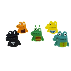 Detailed view of five unique TPR crocodile finger puppets in various cartoon designs