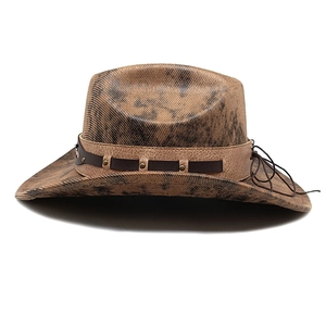 Detail of distressed texture Western cowboy hat with bronze rivets and leather band