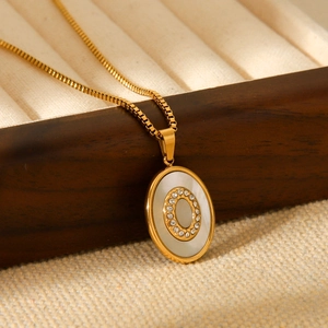 18K gold plated stainless steel necklace with white shell oval pendant and crystals