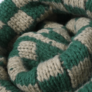 Checkerboard knit beanie with thick green and beige texture for winter warmth