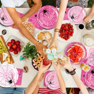 Pink spider web disposable party tableware set with paper plates and napkins for Halloween