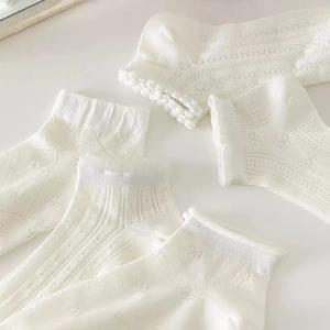White cotton ballet style socks with lace ruffles, lace trim and mesh patterns